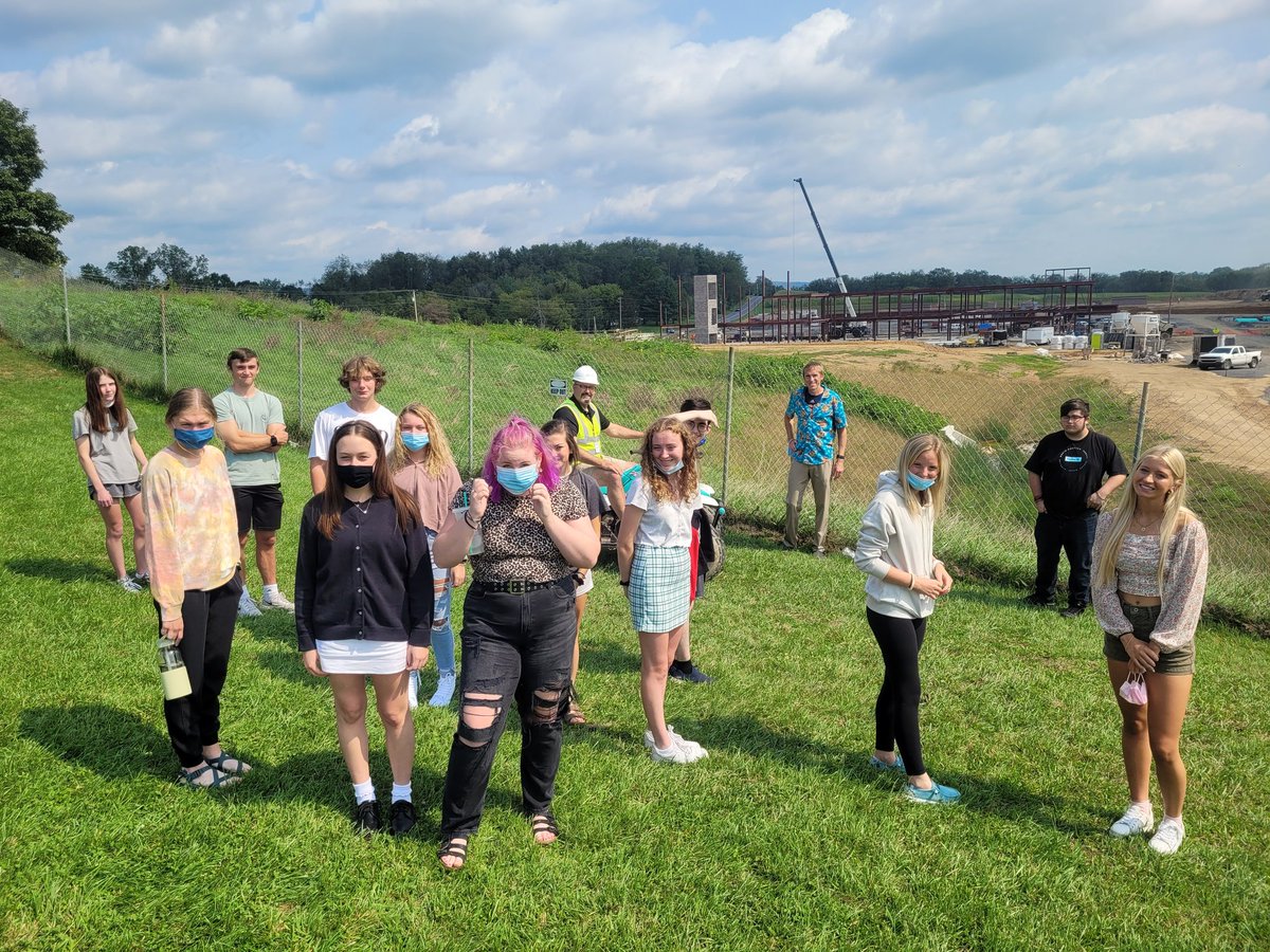 Mr. Peace's and Mr. Hoffman's Classes getting a tour of how the water runoff will be taken care with the building project.