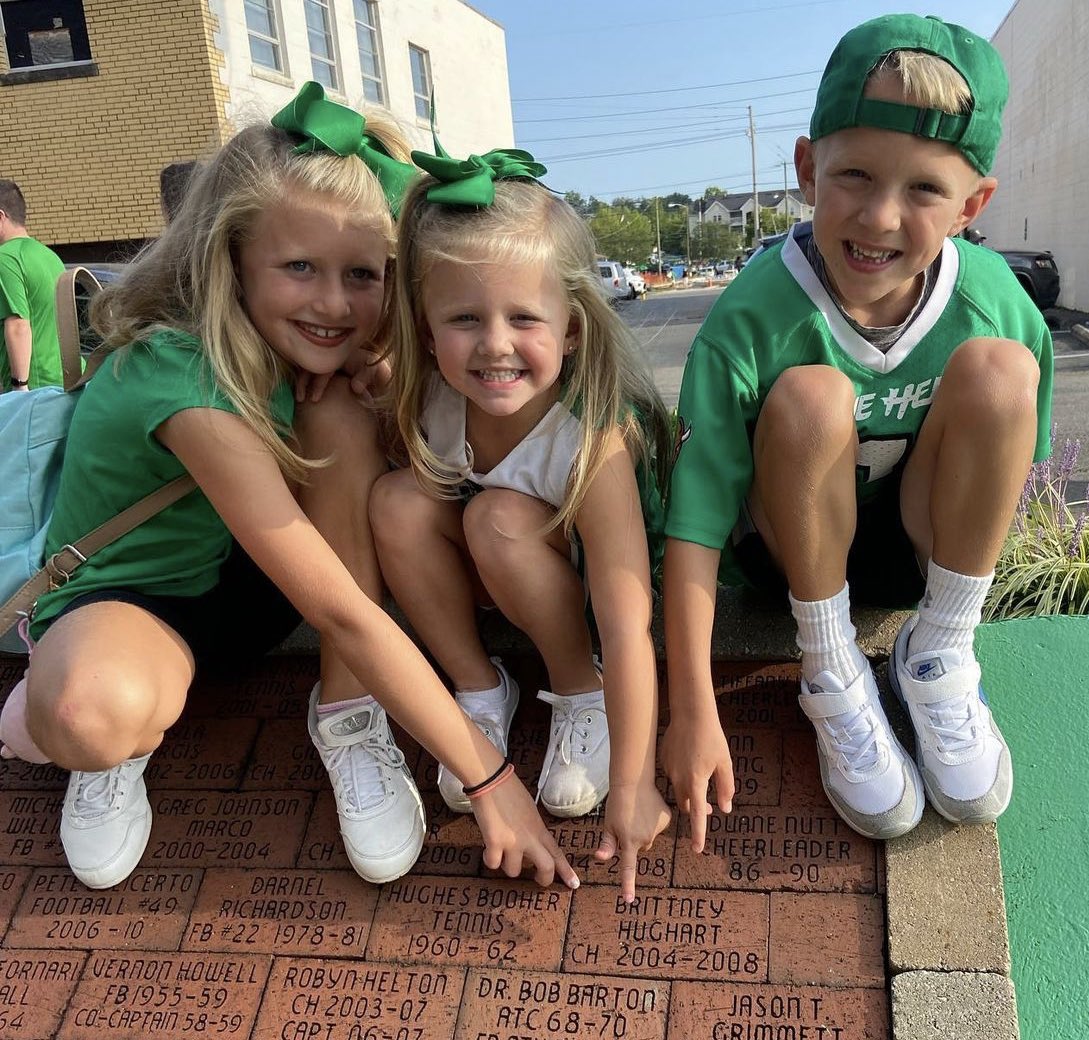 #SmithBabiesThree pointing at their mommas brick! MU CHEER 04-08