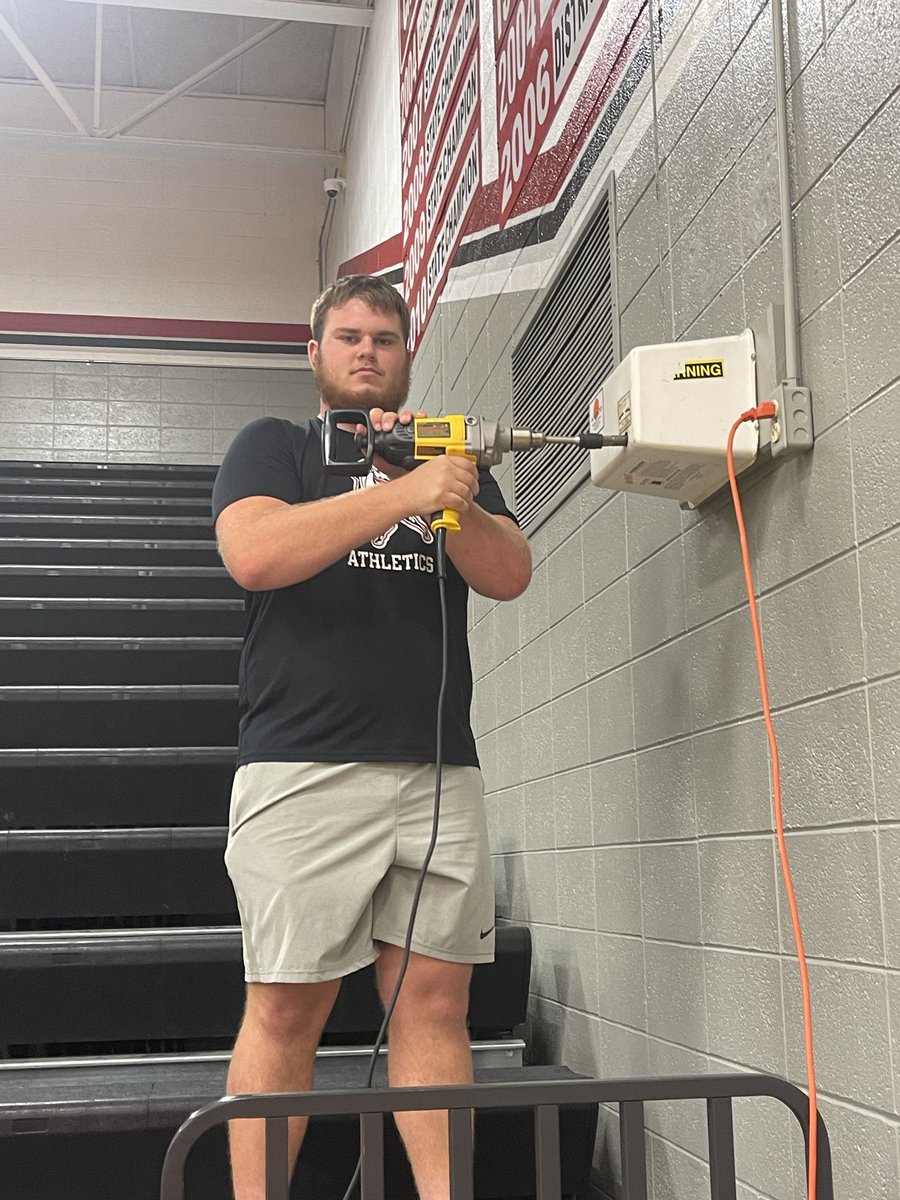 Hard at it again today.  Setting up for volleyball and JV football.