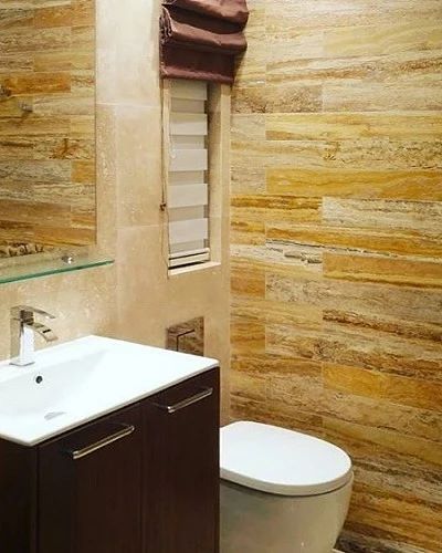 The #bathroom design that gets #stylish with #gold #travertine. Featured product is Golden Colossae #travertine, Vein-Cut, #planktile, filled and honed finishing. Please visit to our website for vein-cut collections.

#dreambathroom #bathroomdesign #modernbathroom #bathroomtiles