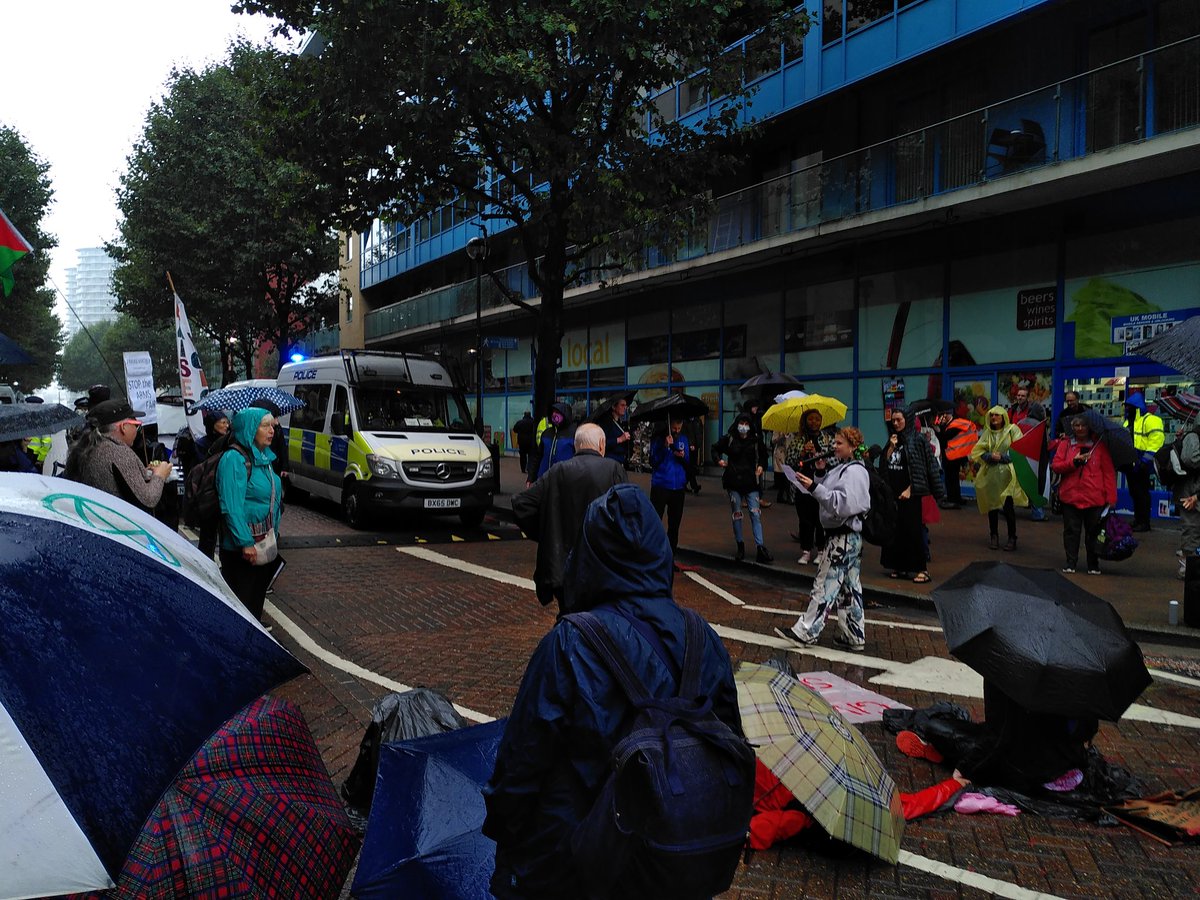 More people now arriving to resist the #DSEI arms fair despite heavy rain. #StopDSEI
