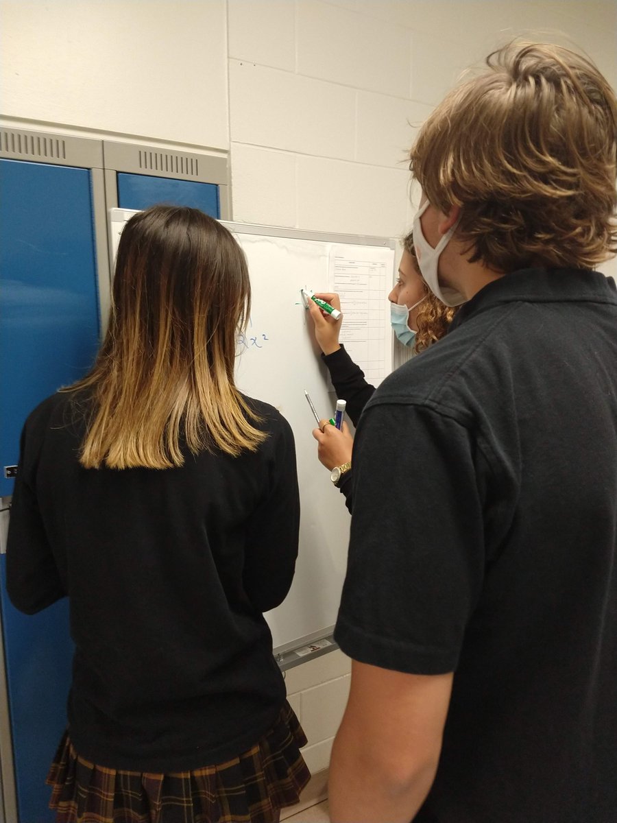 Reviewing some math - vertically - on our new rolling whiteboards! #admirethetiger #ocsbMath <a href="/StMatthewOCSB/">St. Matthew High School</a>