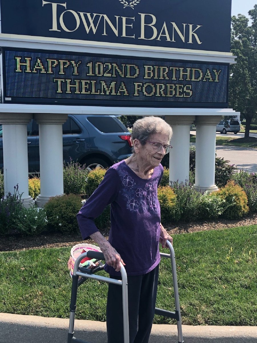 TowneBanking's tweet photo. What a milestone! Thelma Forbes turned 102 on September 12, and her family brought her to TowneBank in Churchland (Portsmouth) to see her name in lights. Happy Birthday, Thelma. Thank you for being a treasured member of the Towne Family! #TowneBank #ServingOthers #EnrichingLives https://t.co/u7YubbhweK