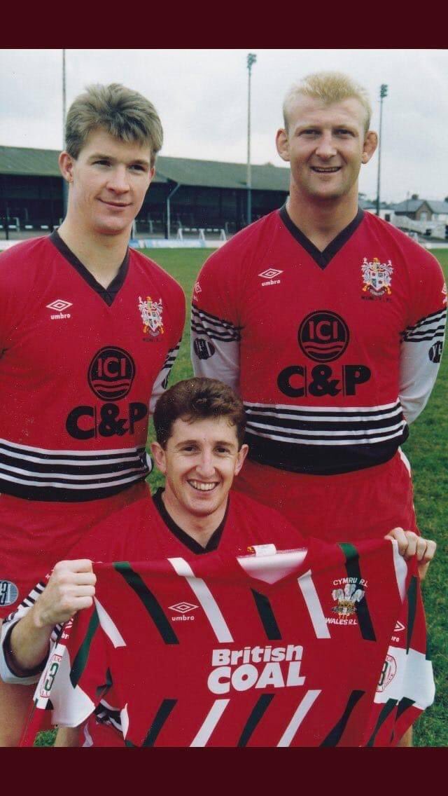 Three former dual code <a href="/WalesRugbyL/">Wales Rugby League</a> <a href="/WelshRugbyUnion/">Welsh Rugby Union 🏴󠁧󠁢󠁷󠁬󠁳󠁿</a> internationals photographed in their <a href="/WidnesRL/">Widnes Vikings</a> kit at Naughton Park, John Devereux, Paul Moriarty and Johnathan Davies. All became great favourites at Widnes.