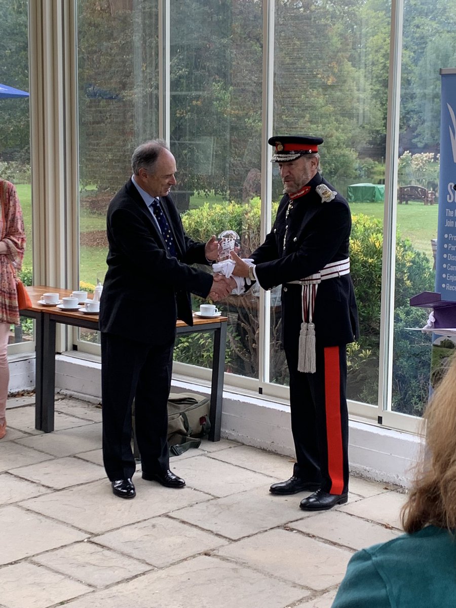 A pleasure to be with fellow <a href="/VerValleySoc/">Ver Valley Society</a> volunteers as the group was presented the Queen’s Award for Volunteering this morning. ‘The MBE for volunteers’. Pictured: Lord Lieutenant of Hertfordshire, Robert Voss CBE CStJ and chair of the VVS John Pritchard