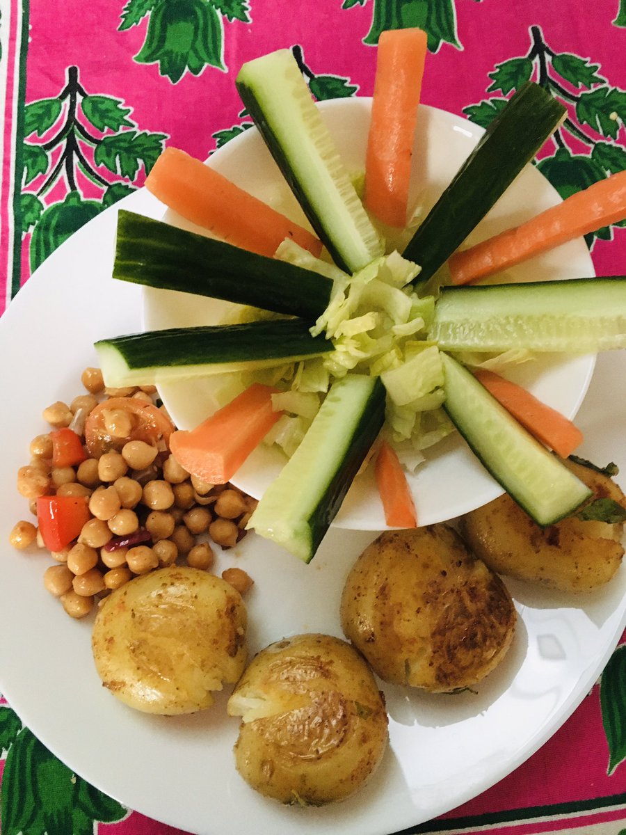 #simple #weekdayMeal #healthy #babyPotatoes boiled and squashed sautéed hot in olive oil and #harissa with a #chickpea and tomato salad and crunchy veg #vegetarian #homemade #speedy #StaySafe #Sunshine 🌸