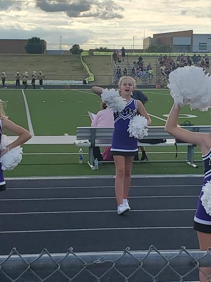 AmyParten32's tweet image. Samantha&apos;s first TMS game as a Cheerleader 💜🤍💜 and a fun surprise from Cheer Dad there to watch her 😍  #hawkcheer @TMSHawksCheer @TimberviewMS #SamanthaLynn09