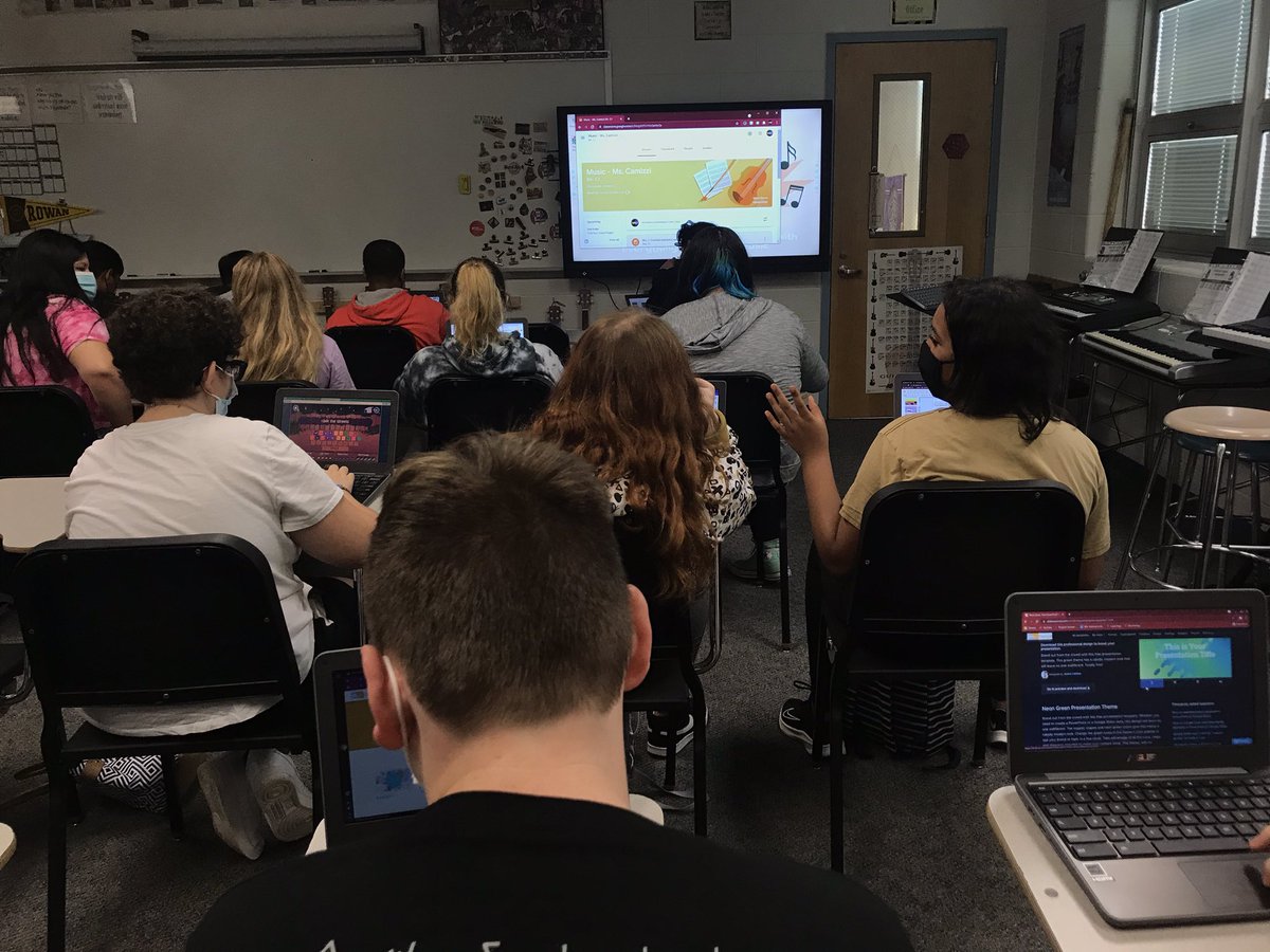 JECamitzzi's tweet photo. Students working on a project in #MusicClass called #FindYourVoice showing them how #music is infused to almost every aspect of their lives. We are using @Google Classroom and #googleslides to create multimedia presentations to share. #mtms #middleschool #jrhighmusic https://t.co/Wis8tK5RQA