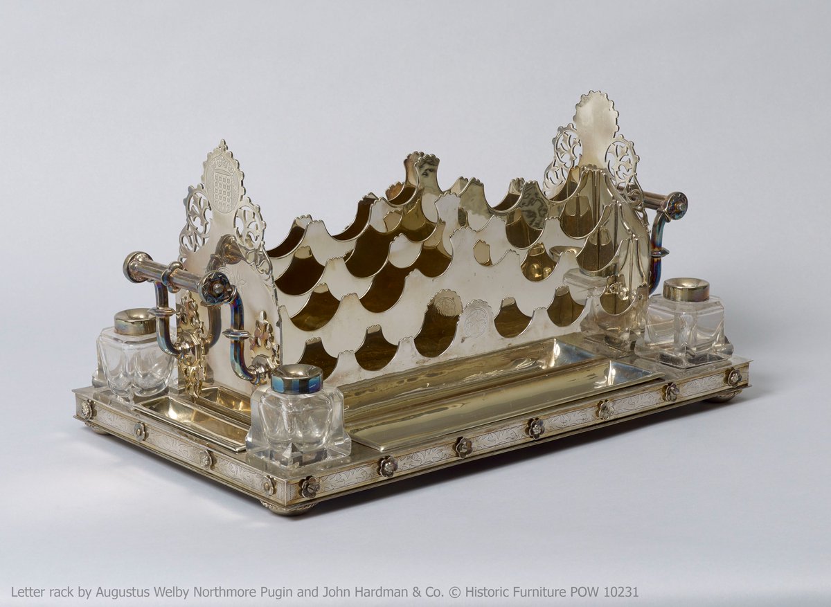 Emily: One of my favourite items in the collection is this silver letter rack, designed by A.W.N. Pugin and made by John Hardman & Co in Birmingham c.1850. Pugin believed that decorative elements of objects should also be functional - even the screws are in the shape of flowers!