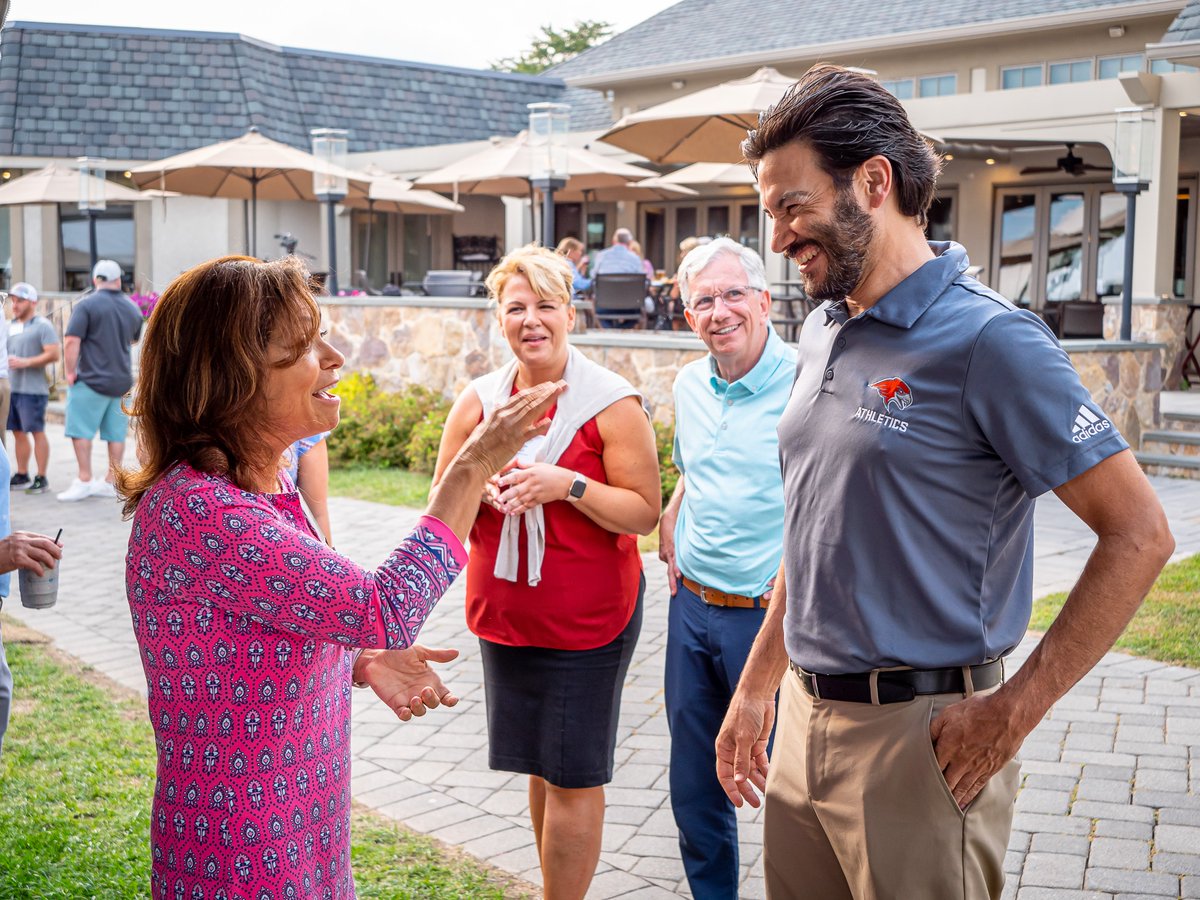 JonathanKoppell's tweet photo. Enjoyed talking with Michele Ansbacher CY, VP Colleen Coppla and @DennisBone2 at the reception after the #RedHawkOpen. Our generous alumni are making a big difference for our students. https://t.co/LnVyvoDXS5