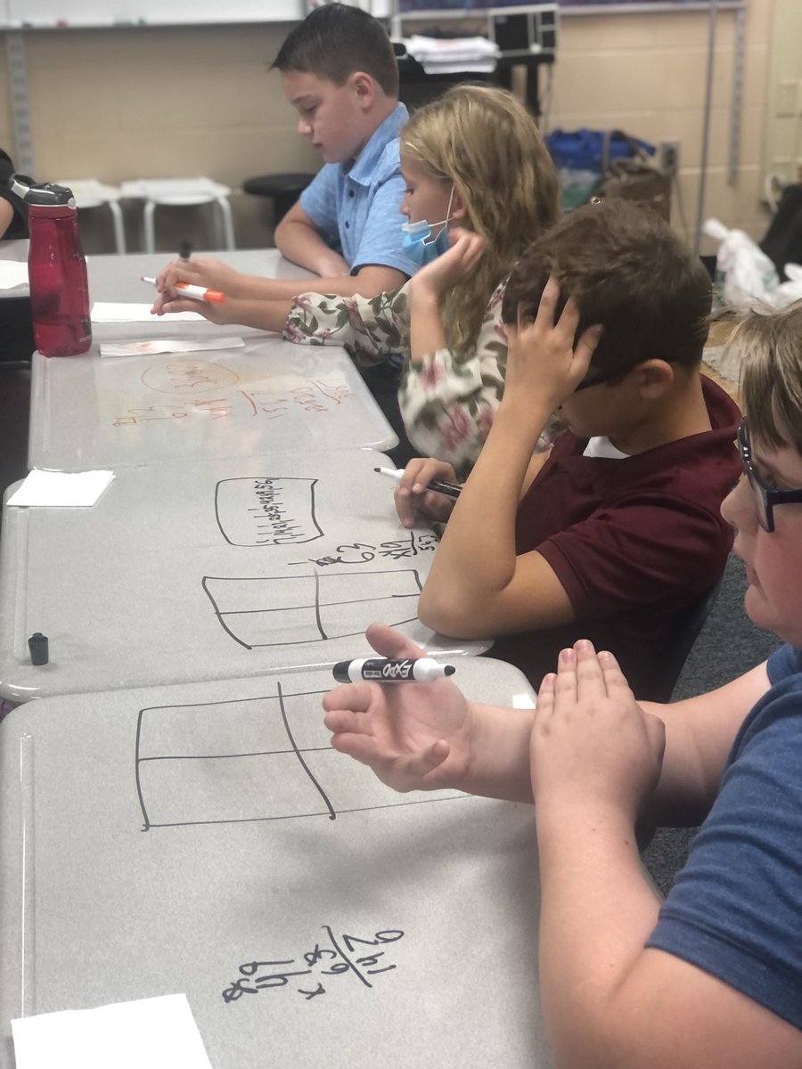 MrsMooreMCE's tweet image. Multiplication fun on our desks today! Look at that second picture with the “basic algorithm” label. 🤩 I love when my kiddos learn new vocabulary words! #vimme 🐻