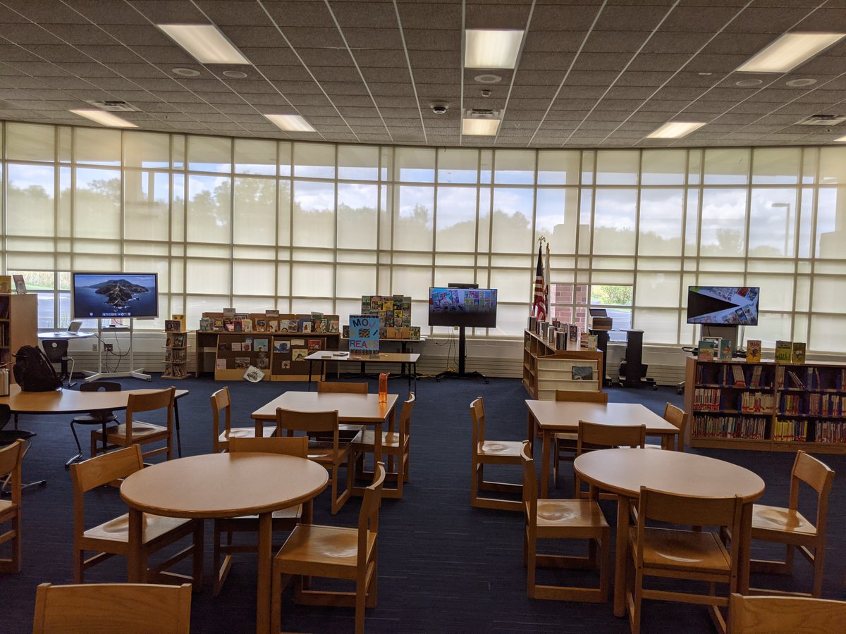 Using TVs and a Samsung Flip to loop book suggestions and trailers in the Country Meadows Learning Center.