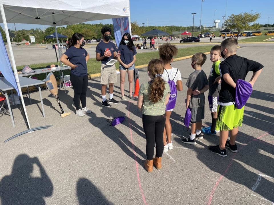 OlatheBIOeng's tweet photo. Proud of these seniors for representing us at Careers on Wheels today at CBAC! We hope to see these 4th graders apply to our academy in about 4 more years! #futurebioengineers @Olathe21st https://t.co/V4vkpk65VO