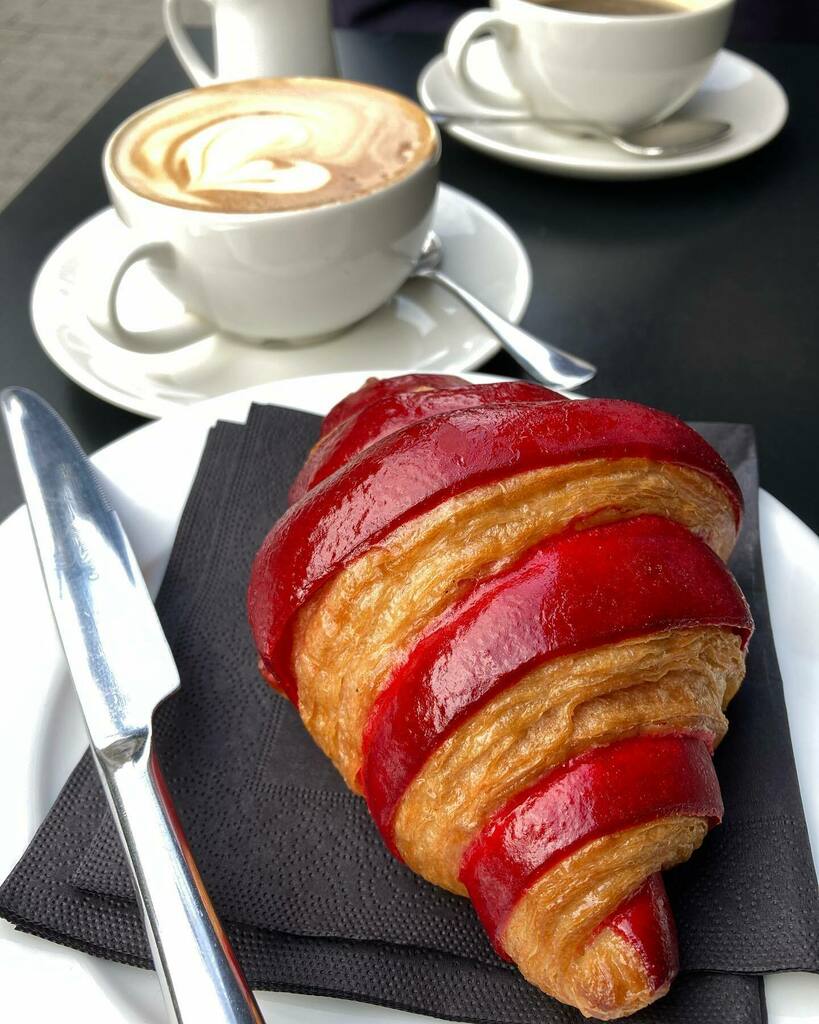 Feeling very Parisian at @eat17restaurant this morning, this is their raspberry croissant with ruby red laminated dough and a dab of custard instead. Swipe to see the pleasing swirly interior. 🥐 🥐 ☕️ ☕️ 
.
.
.
.
#walthamstow #walthamstowvillage #croissantlover #continentalbr…