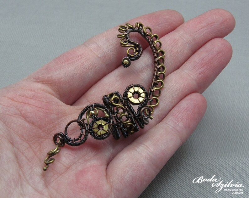 bodaszilvia's tweet photo. And one more: my last new piece of #jewelry, a #steampunk #earwrap for this week — tomorrow I'll have a new mini painting! 😊

#etsy #etsyshop #jewellery #jewelrydesigner #wirewrapped #wirewrap #handmadejewellery #handmadejewelry #handmade #etsyhandmade

https://t.co/dkhEFxVTBO https://t.co/8sHKMRg3x7