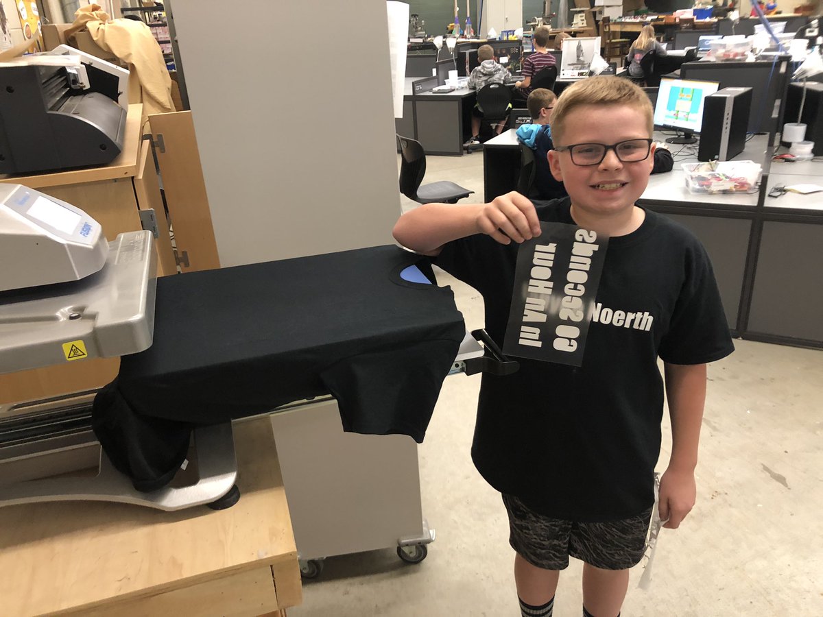 tigerroboticssd's tweet photo. One of my @HSMSTigers discovers our t-shirt press and taught himself how to cut vinyl and make t-shirts. Couple of  @DollarGeneral t-shirts later he is making his third T while wearing his second T. Only the 2nd student to ever try the press out. https://t.co/sGQu2fFX3P