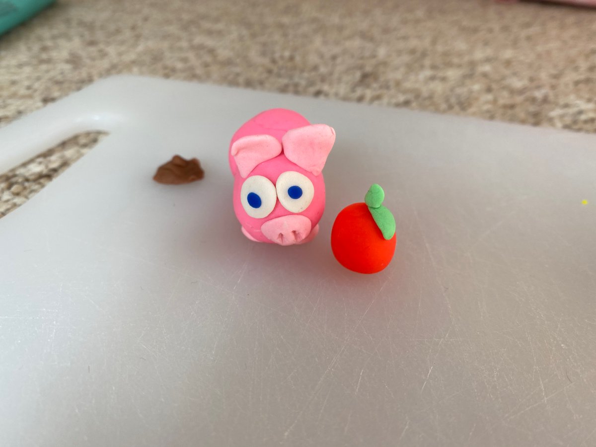 Sandral512's tweet photo. @rebootonline @PlayDoh Pig eating an apple (with a bonus 💩) https://t.co/lw7mmbhdwd