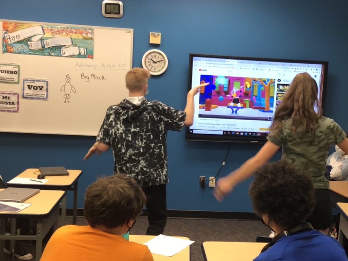 CASpanish1's tweet photo. C/A Spanish students have been hard at work trying to win The Unfair Game and completing their Setup Stations.  We had to raise some of the desks because everyone is taller this year! https://t.co/9QU6dKYpzB