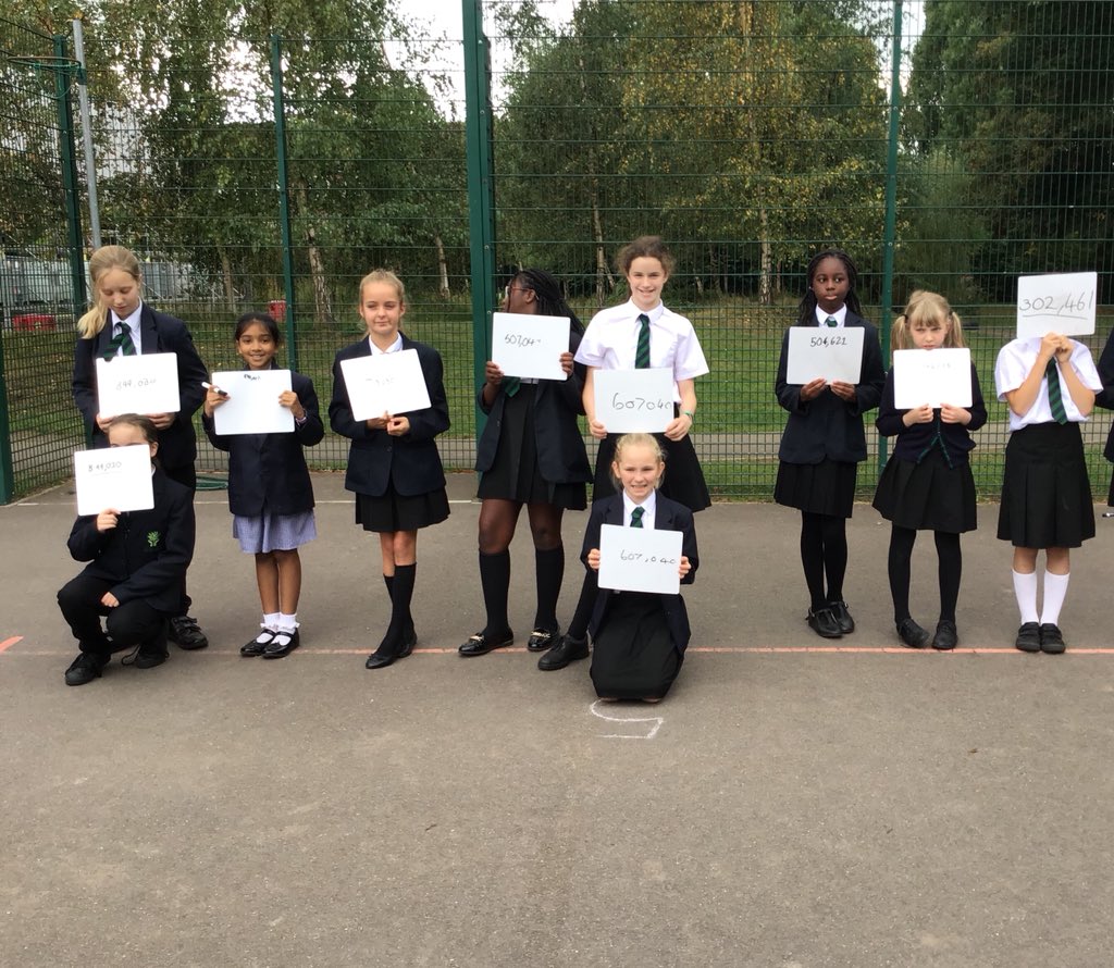 Year6TLTPAarch's tweet photo. Ordering and comparing big numbers! This clever lot decided to sit in front of each other if they had the same number, as standing next to each other might have implied one number was bigger than the other #mathsreasoning @WhiteRoseMaths https://t.co/qM5sGpmmeH