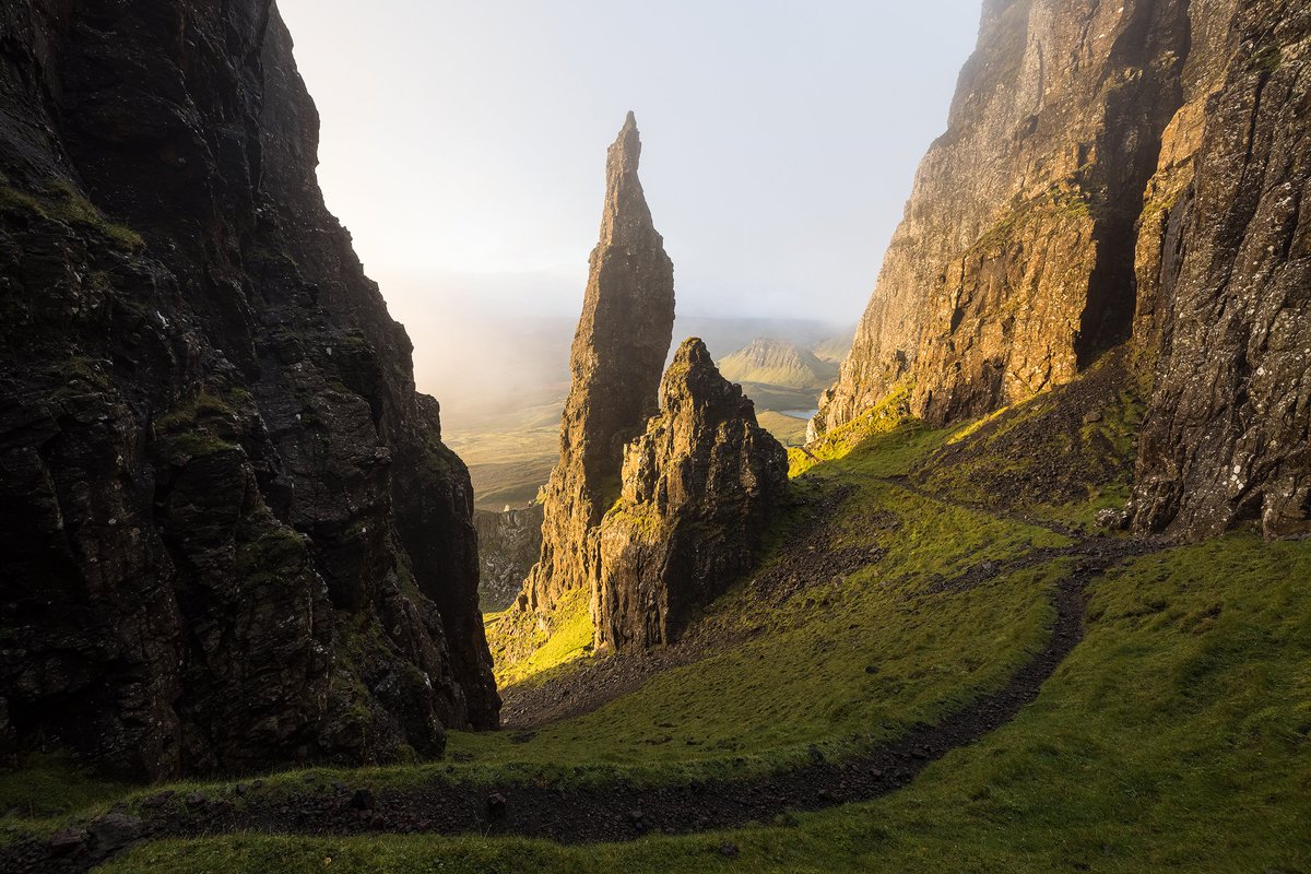 From yesterday morning up at The Needle. We arrived to some lovely low lying cloud surrounding the pinnacle, which luckily hung around when first light hit the rock.

The shot is from when the low cloud started to thin out and reveal the landscape behind. 

<a href="/SkyeAcademy/">Skye Photo Academy</a>
