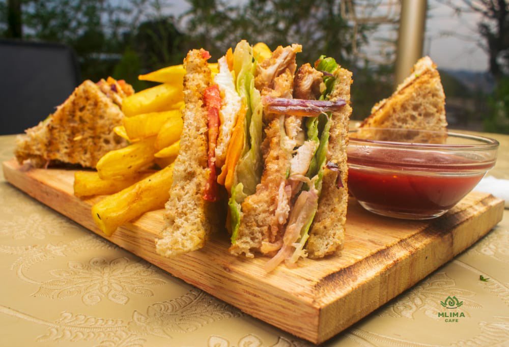 AllanSseky's tweet photo. Hey guys, Today on the special at @MlimaCafe we have sandwich with fries @ 15k only. 
Call 0753098416 or visit https://t.co/mLoY3nCqEp to place your order. 🚗
We're located in Mutundwe Nalukolongo road opp Abasi Balinde transporters. https://t.co/a9WsNCBskD