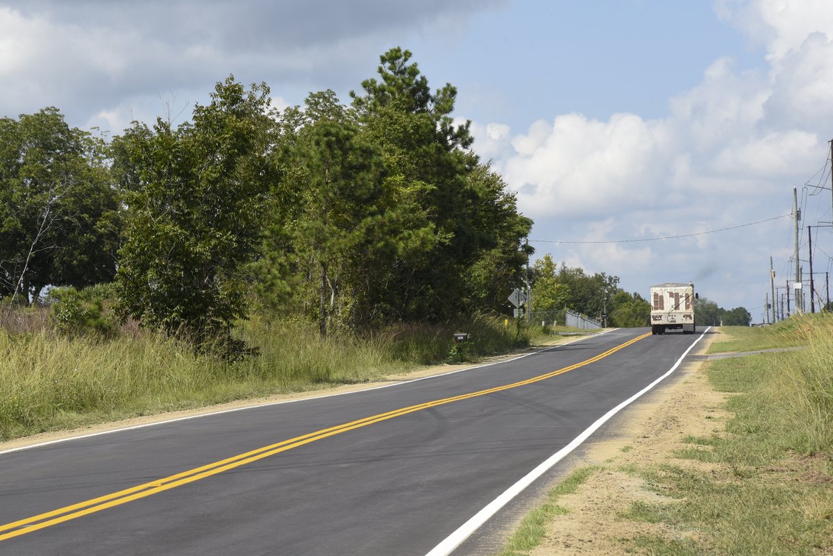 SCDOTPress's tweet photo. Newly repaved Cut Off Road in Orangeburg County includes thermoplastic paint on center and edge lines with rumble strips to be added soon – all part of SCDOT’s Strategic 10-Year Plan to improve our roads and bridges. #ProgressisourPriority https://t.co/OpLneCW6Mp