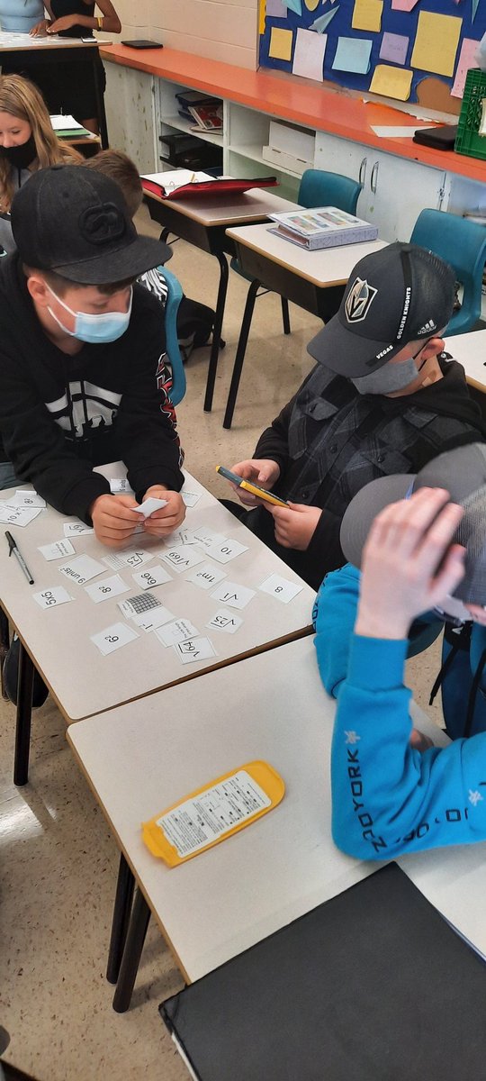 MrSimpsonMath's tweet photo. Grade 8s @GBJHS did a card sorting activity to review squaring, square rooting and how those concepts relate to the side length and area of a square. #hrce_math https://t.co/DrsxJbfmGo