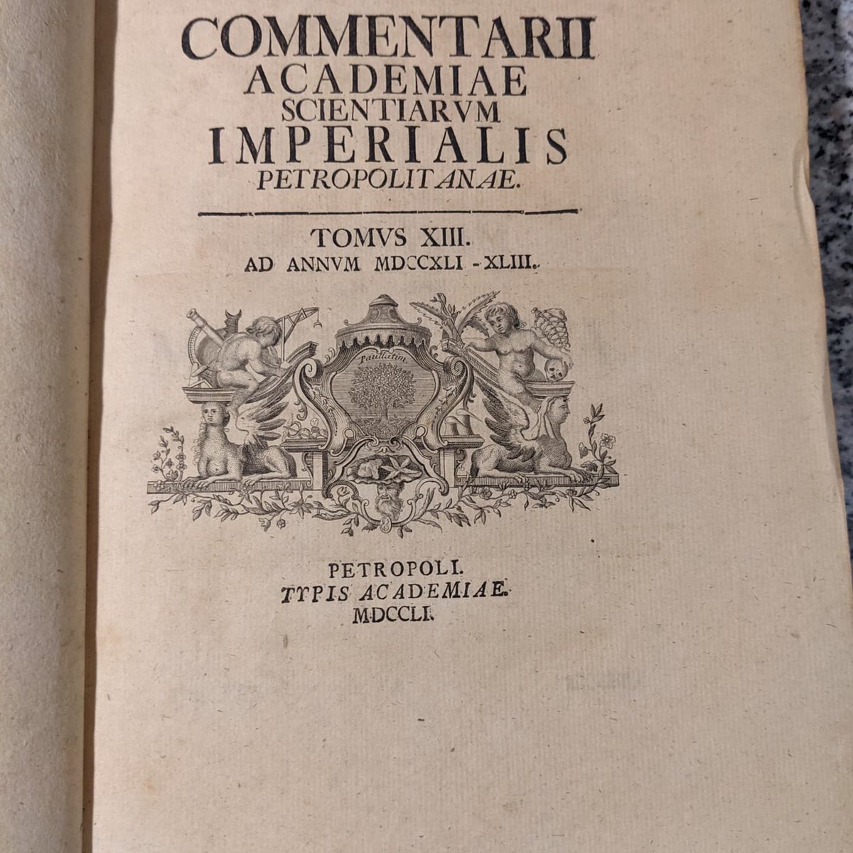 _chenson__'s tweet image. I figured my math followers would especially appreciate this! Just got these, they are originals from 1740 and 1751. Include the original publication of Euler's solution to the Basel problem, among other very cool things. So crazy to have these pieces of history on my bookshelf.