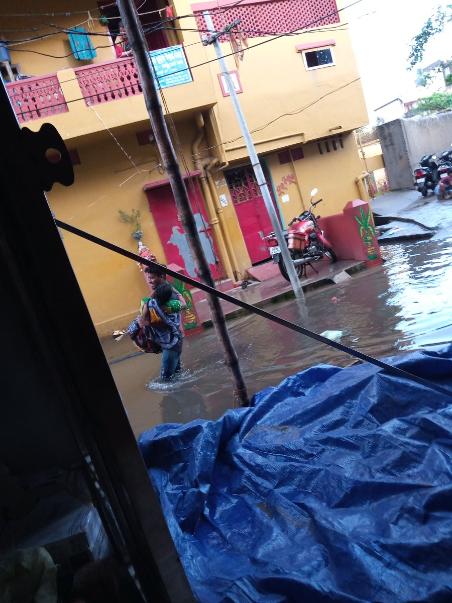 RajibParida0's tweet photo. @AnanyaDasIAS Today only 30 min rain and this condition, A son is taking his ill mother from Dr.Niranjan Tripathy clinic.. what a situation... But than also no reply from your side Mam..🙏 https://t.co/fXaEVzRfE1