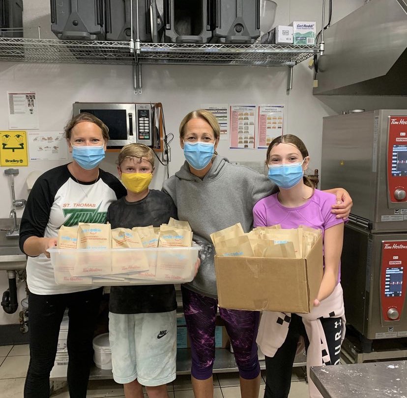 All smiles after decorating and packaging more #SmileCookies! Our volunteers rock! ❤️ 

#thankful #smalltownbigheart #TimHortons