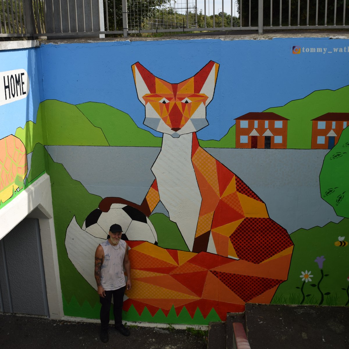 I went to photograph the Barton subway art this morning and found Tommy Watkins <a href="/TommyWatkinsArt/">Tommy Watkins</a> still hard at work on the south (Headington) side. Here he is, dwarfed by his magnificent creation
