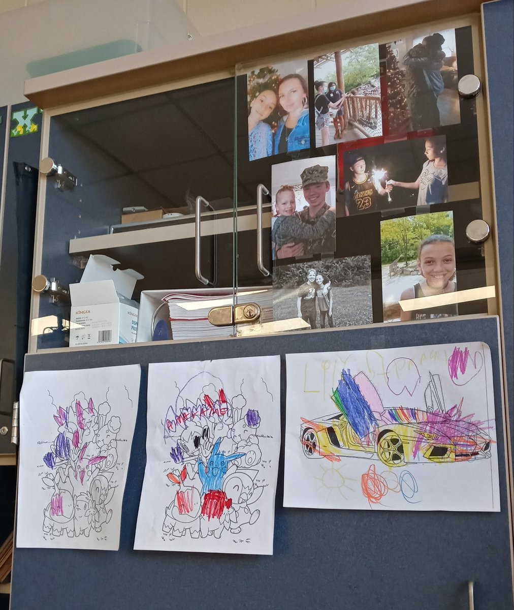 RachelYonts1's tweet photo. Student artwork displayed under pictures of my babies 😍 All my kiddos represented in one place 💜 #CVBetterTogether #MyIttyBittyMiddies https://t.co/BfuIdWM14a