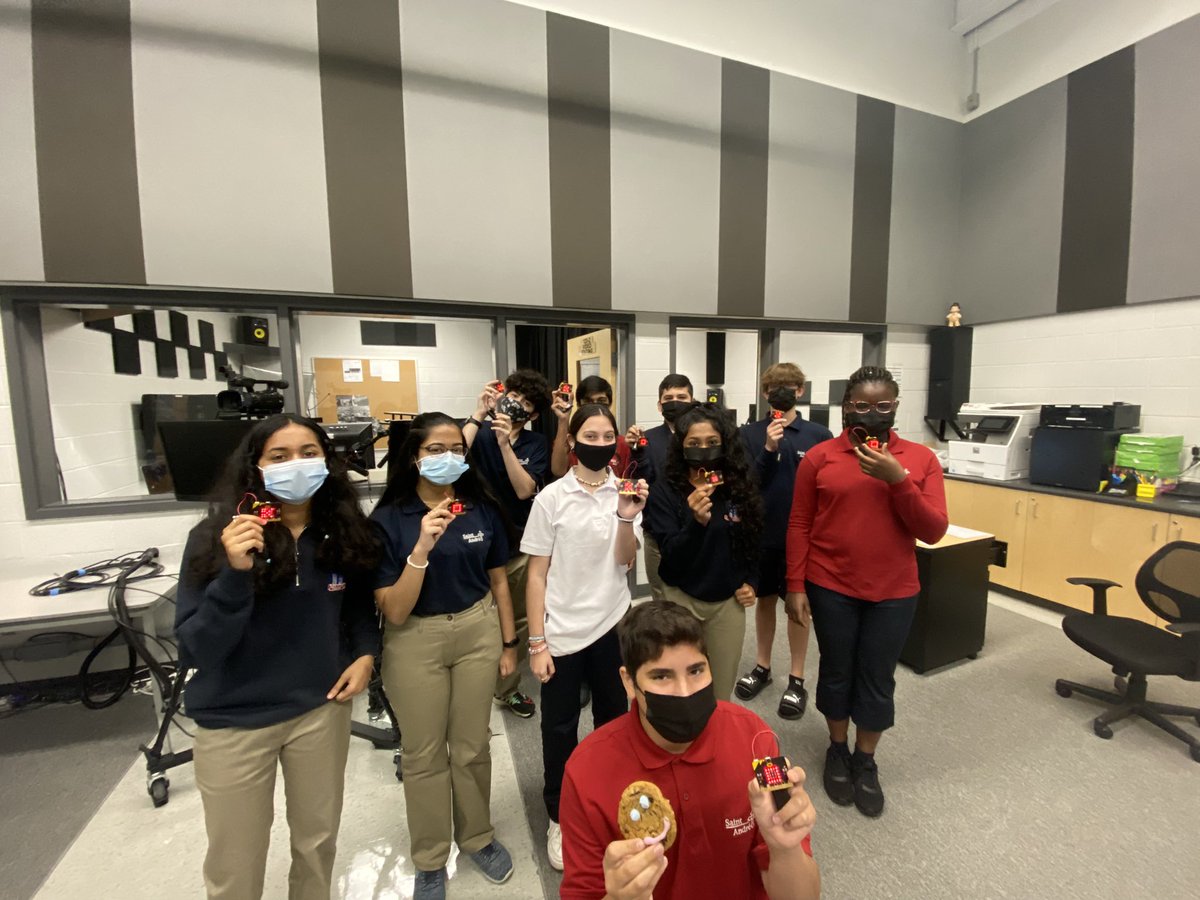 TechnologySab's tweet image. Grade 9 tech using Mico-bit processor to make paper-scissors-rock game.  Big winner has the smile cookie. #SmileCookie