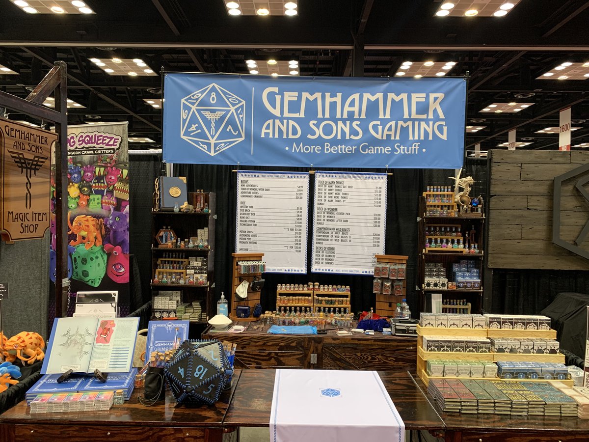 GemhammerGaming's tweet photo. We’re all set up and ready to go at #gencon. Be sure to come pay us a visit at Booth 1239 for all your more better game stuff! 

#conventions #live #gemhammer #gethype #ttrpg #ttrpgsolidarity https://t.co/QhmTc1h86z