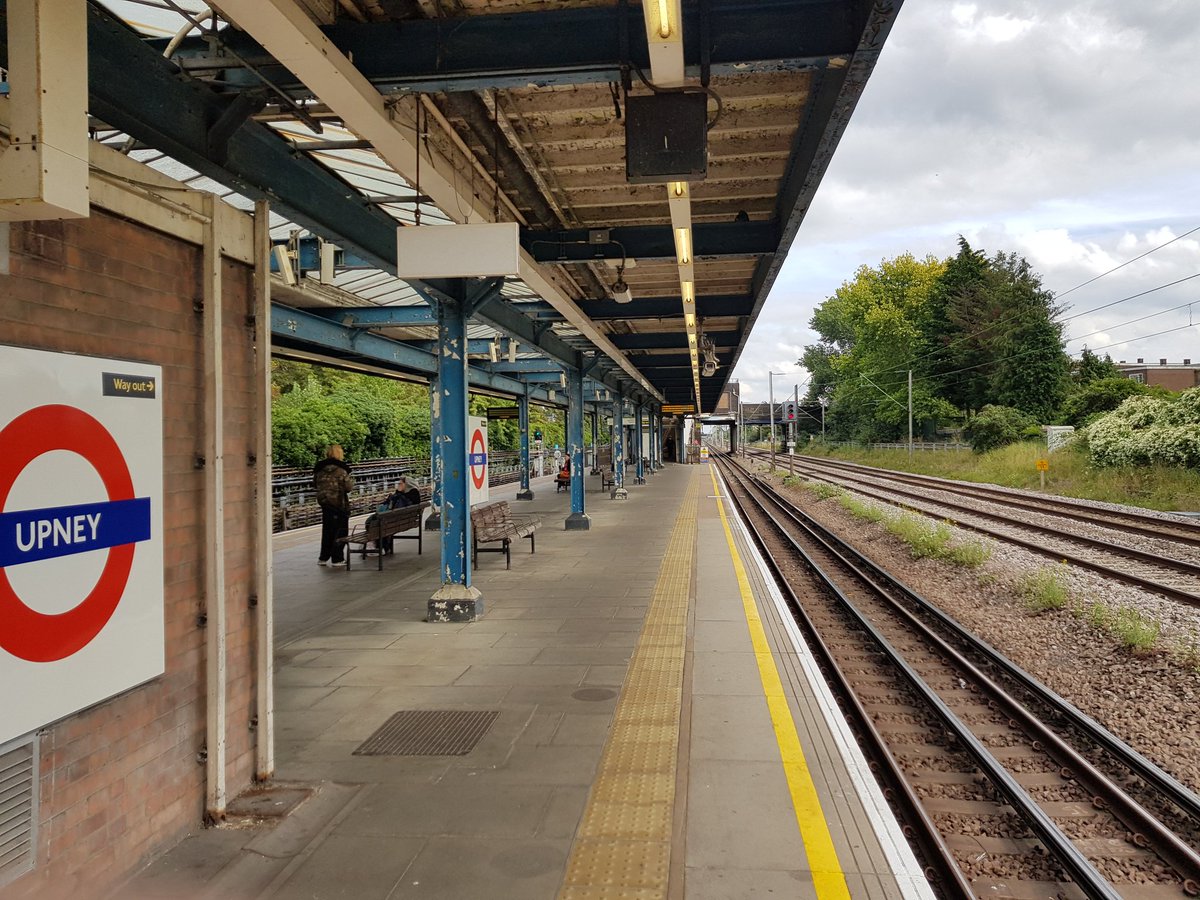 TravellingMOK's tweet photo. Upney: the LMS went for a nice sea blue here, although the paintwork is looking rather woebegone; a large Underground depot lies just to the west #Upney #alphabeticalLondon #Underground #District #BarkingandDagenham #London https://t.co/1z6LlsVfVc