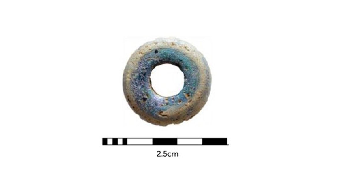 TPArchaeology's tweet photo. #FindsFriday is an #AngloSaxon annular glass bead of opaque blue glass with a white spiral, likely to date to the 7th century and found in Nottinghamshire. Beads like this were common in graves of the early Saxon period but became unpopular in later periods #BritishArchaeology https://t.co/GAJLZ5ItsZ