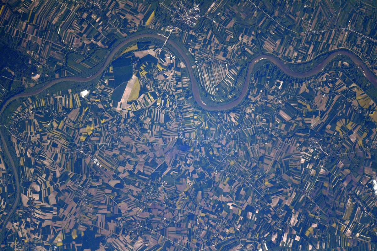 astro_kimbrough's tweet photo. Some views of Earth from space can look like works of art. Can anyone identify this area of unknown farmland in Europe? https://t.co/gK5yFGIPqm