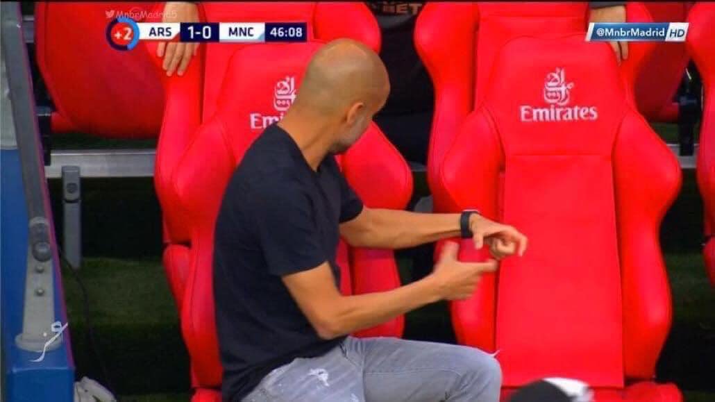 Pep Guardiola arguing with the Man City fans.