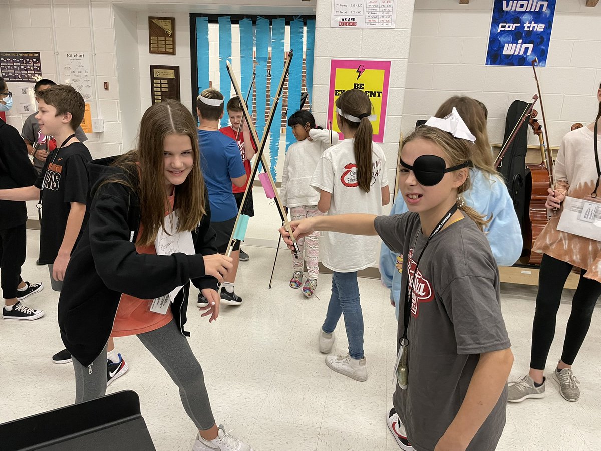 DowningMSOrch's tweet photo. Ahoy from Talk Like a Pirate Day in orchestra! Sword fights and costumes yo ho! Mr Martin made the scallywags walk the plank! #TalkLikeAPirateDay https://t.co/i7aKFdI0JJ