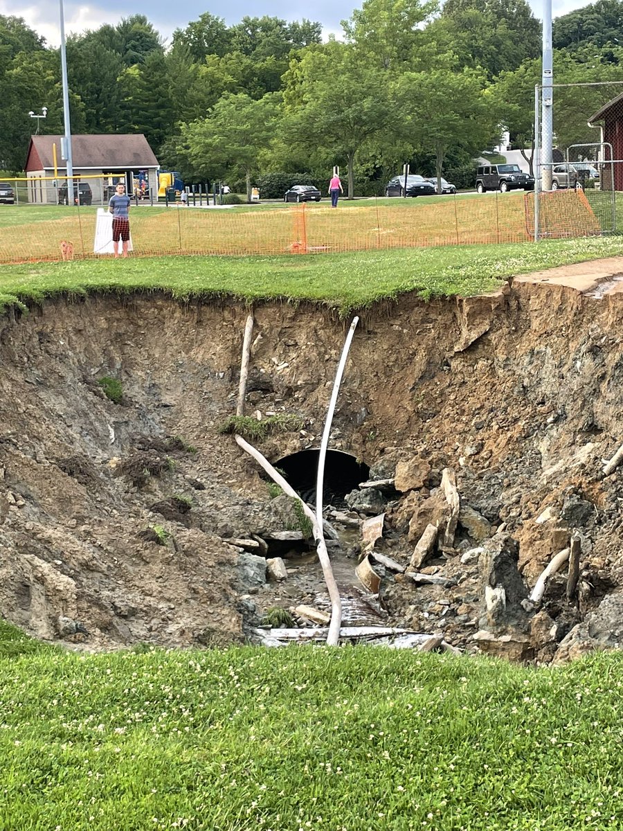 HintzChelsea's tweet photo. More evidence of outdated #stormwater infrastructure leading to huge problems for local communities.    #GreenInfrastructure would help mitigate problems like this. Stream burial is not a solution but is increasingly common. Pics from Summer 2021. #urbanstreams https://t.co/x6uOuyXA3k