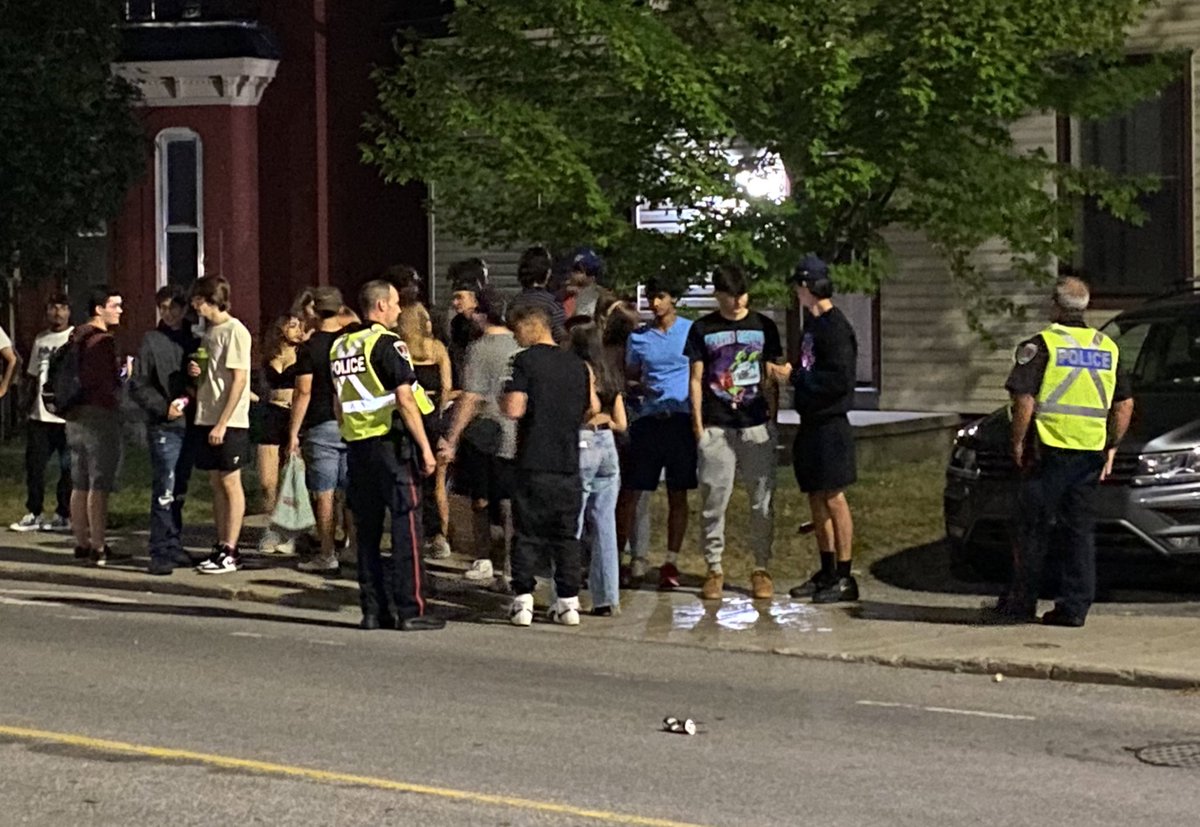 kingstonist's tweet image. Kingston Police and Kingston Bylaw out in heavy numbers in the University District tonight. Residents of one property at the corner of University and Earl hosting a large party just received twelve aggravated nuisance party tickets, for a total of $24,000. #ygk