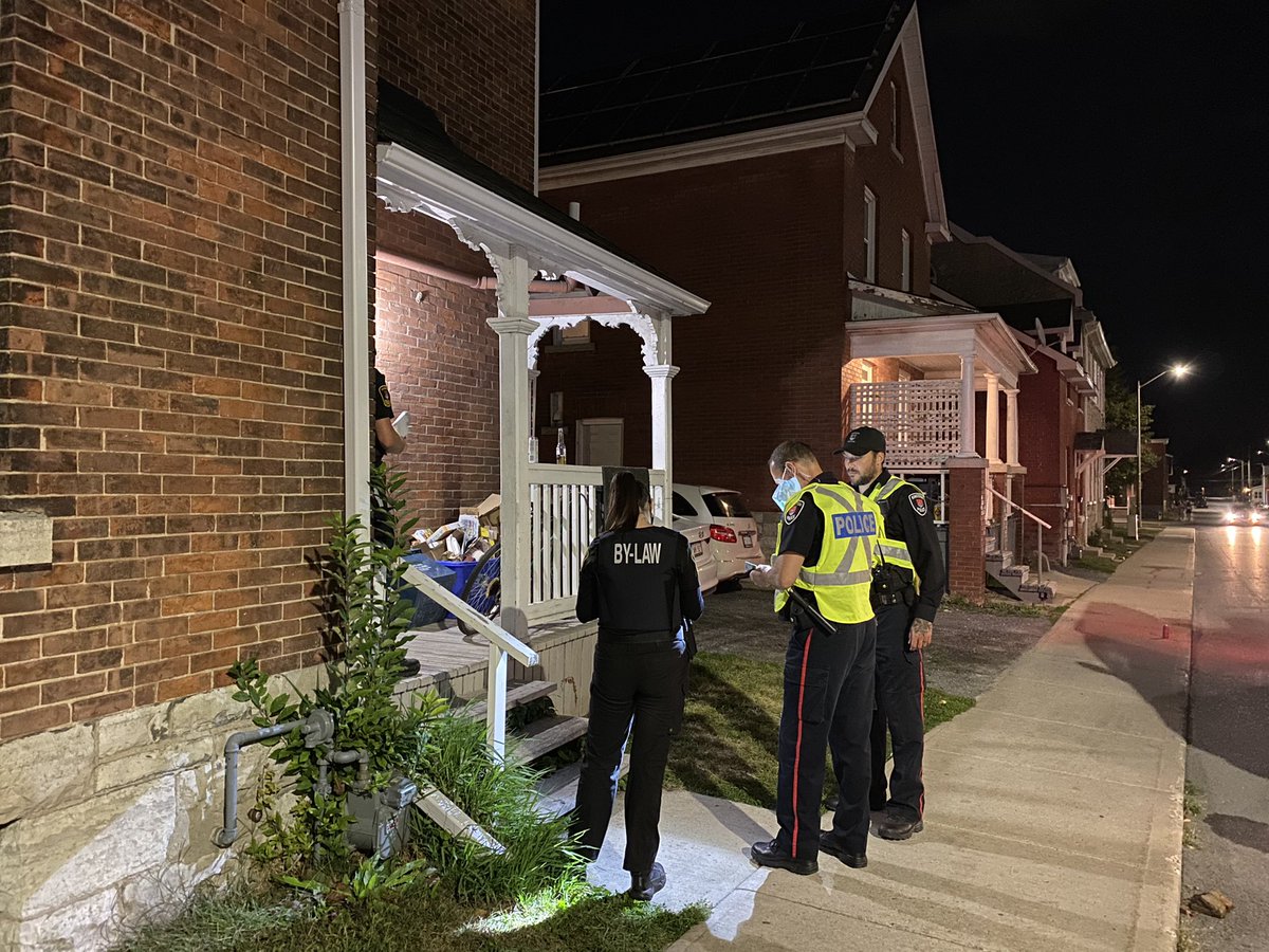 kingstonist's tweet image. Kingston Police and Kingston Bylaw out in heavy numbers in the University District tonight. Residents of one property at the corner of University and Earl hosting a large party just received twelve aggravated nuisance party tickets, for a total of $24,000. #ygk