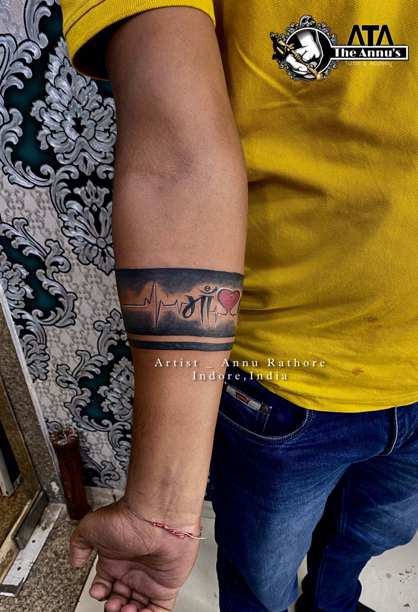 Freehand rudraksha armband with mritunjaya mantra Tattoo and concept by  Anmol Jeswani  Har  Band tattoo designs Forearm band tattoos Band  tattoos for men