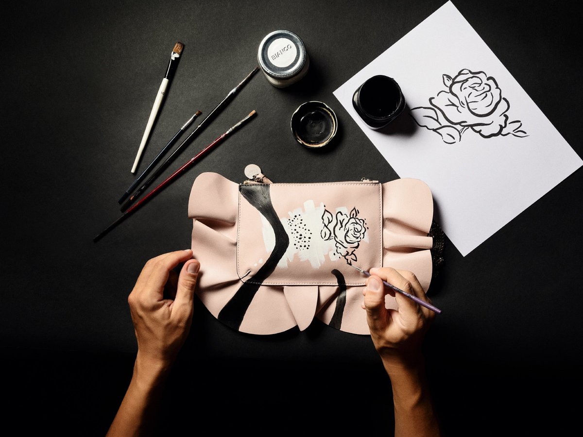 REDValentino's tweet photo. RED(V) presents a special edition of the iconic bags Rock Ruffle and Rock Ruffle XL dedicated exclusively to @FidenzaVillage in collaboration with artist #Robico https://t.co/XEw3KQNyvf
