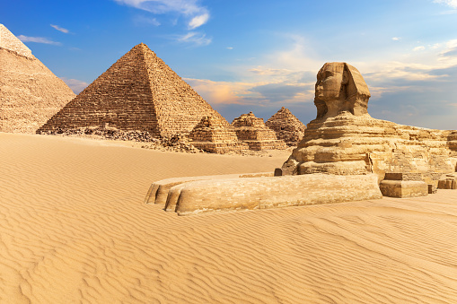 The Sphinx of Giza next to Pyramids in the desert #Egypt