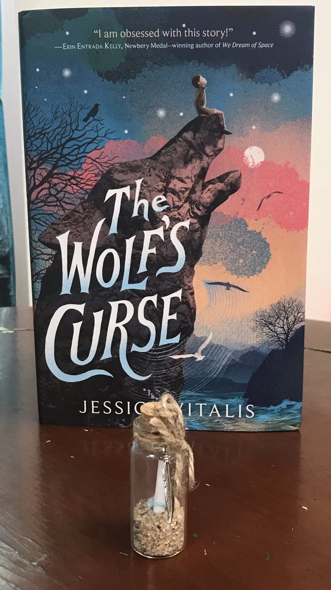 It says to read #TheWolfsCurse by @jessicavitalis!