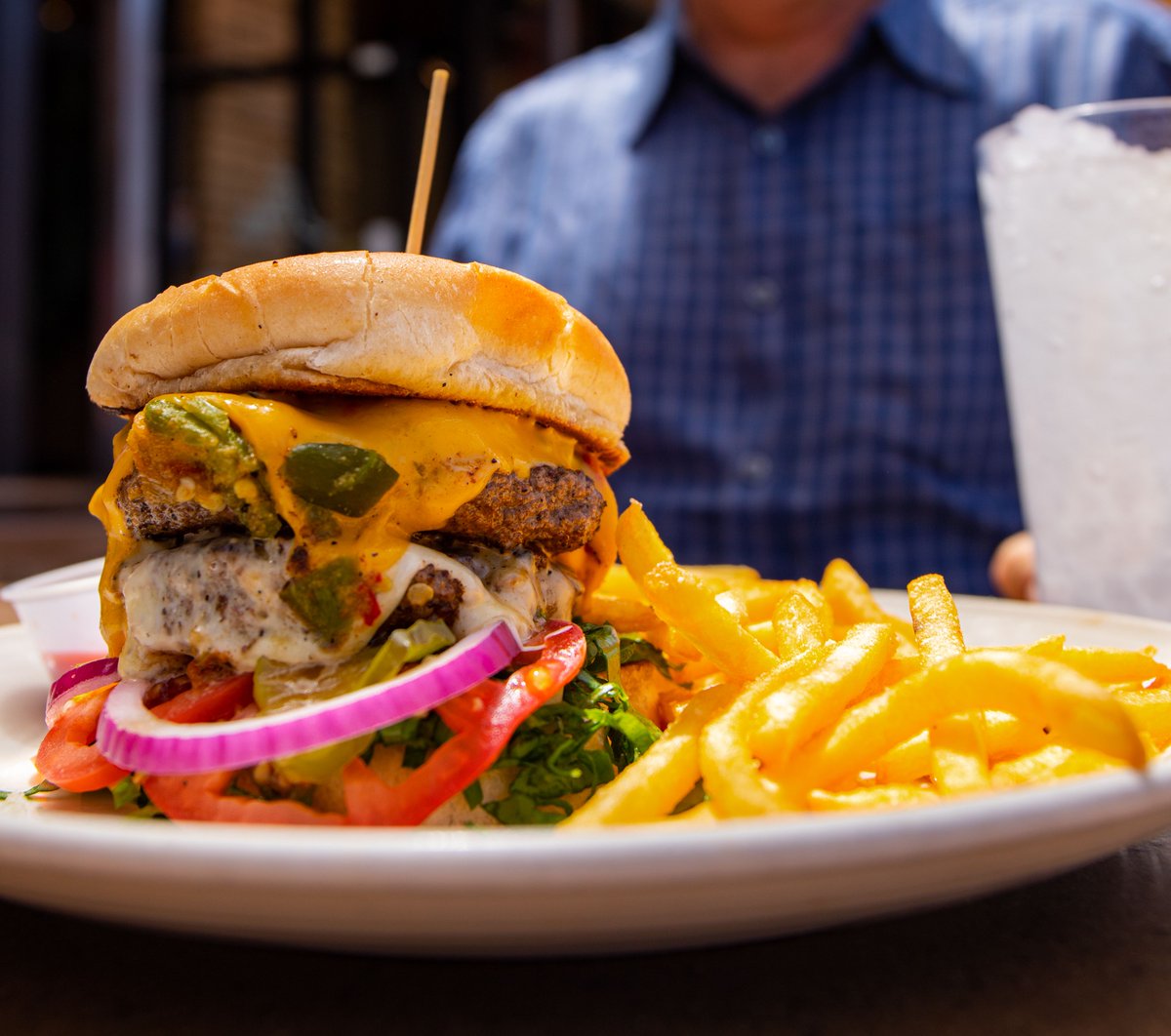 NewMexico's tweet photo. In New Mexico, we celebrate #NationalCheeseburgerDay with plenty of green chile! 😋 #NewMexicoTrue https://t.co/H98xWIywQp