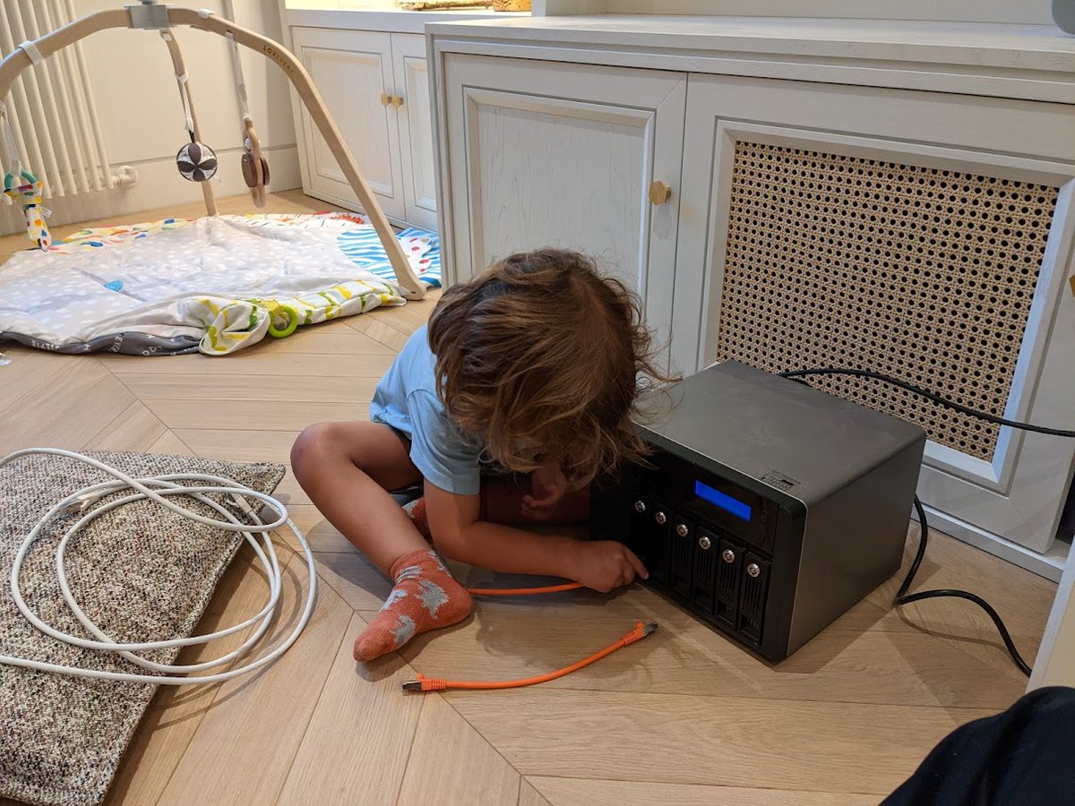 My 3yo is helping me test some Cat6a 10GbE cables, and it's the proudest moment I think I've ever had.