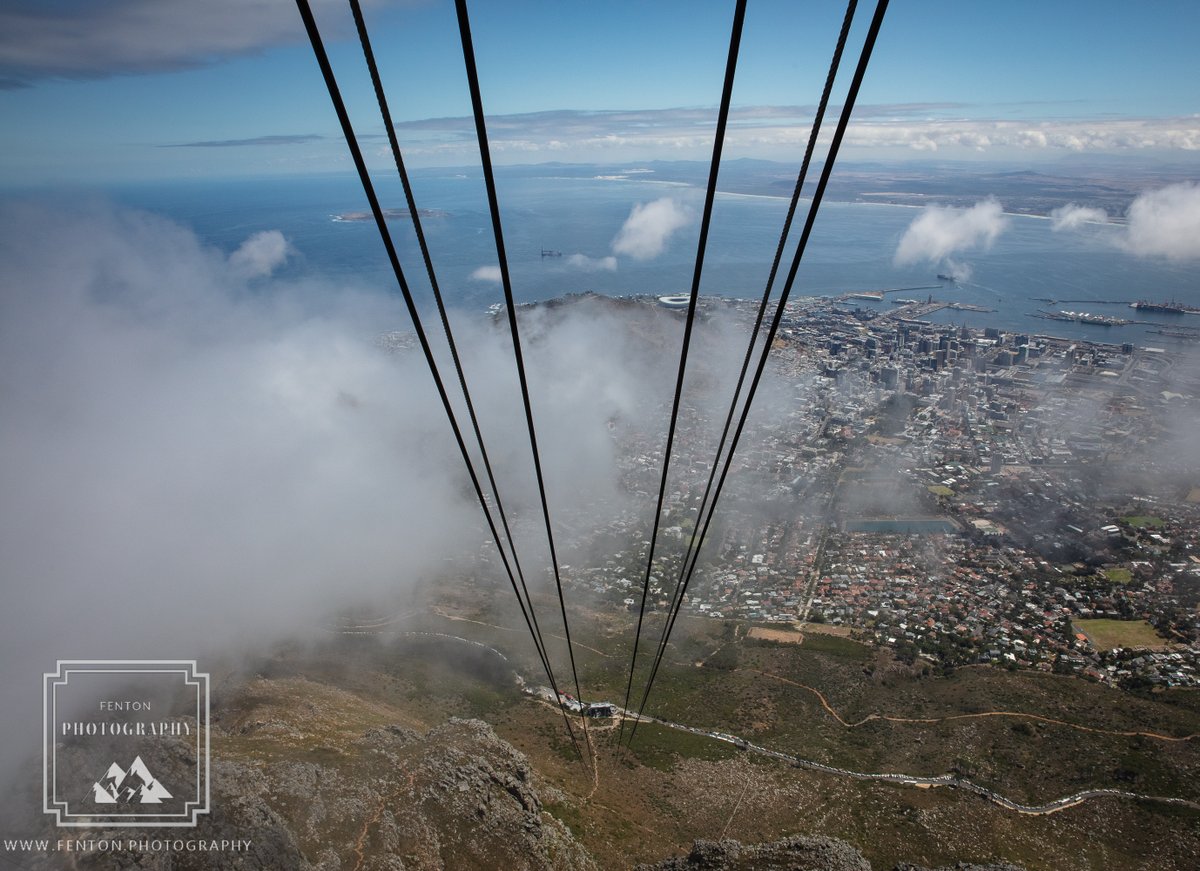 FentonPhoto's tweet photo. Following the cables down to the start of our ride up Table Mountain in Cape Town, South Africa. #cables #clouds #Table_Mountain #CapeTown #SouthAfrica #city @SouthAfrica https://t.co/eBygTb4xr6