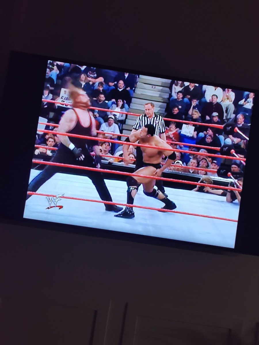 Introducing my 5 year to what a smackdown looks like 😂 Undertaker vs The Rock. Dec 25 2000 <a href="/TheRock/">Dwayne Johnson</a>